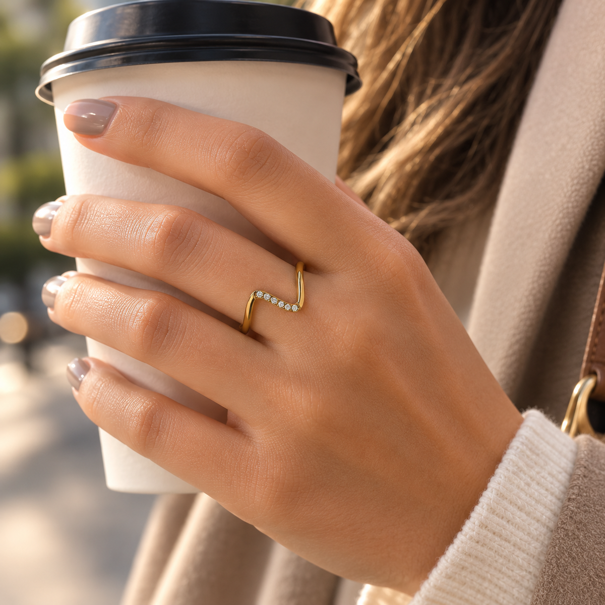 Elara V-Line gold crystal ring lifestyle shot