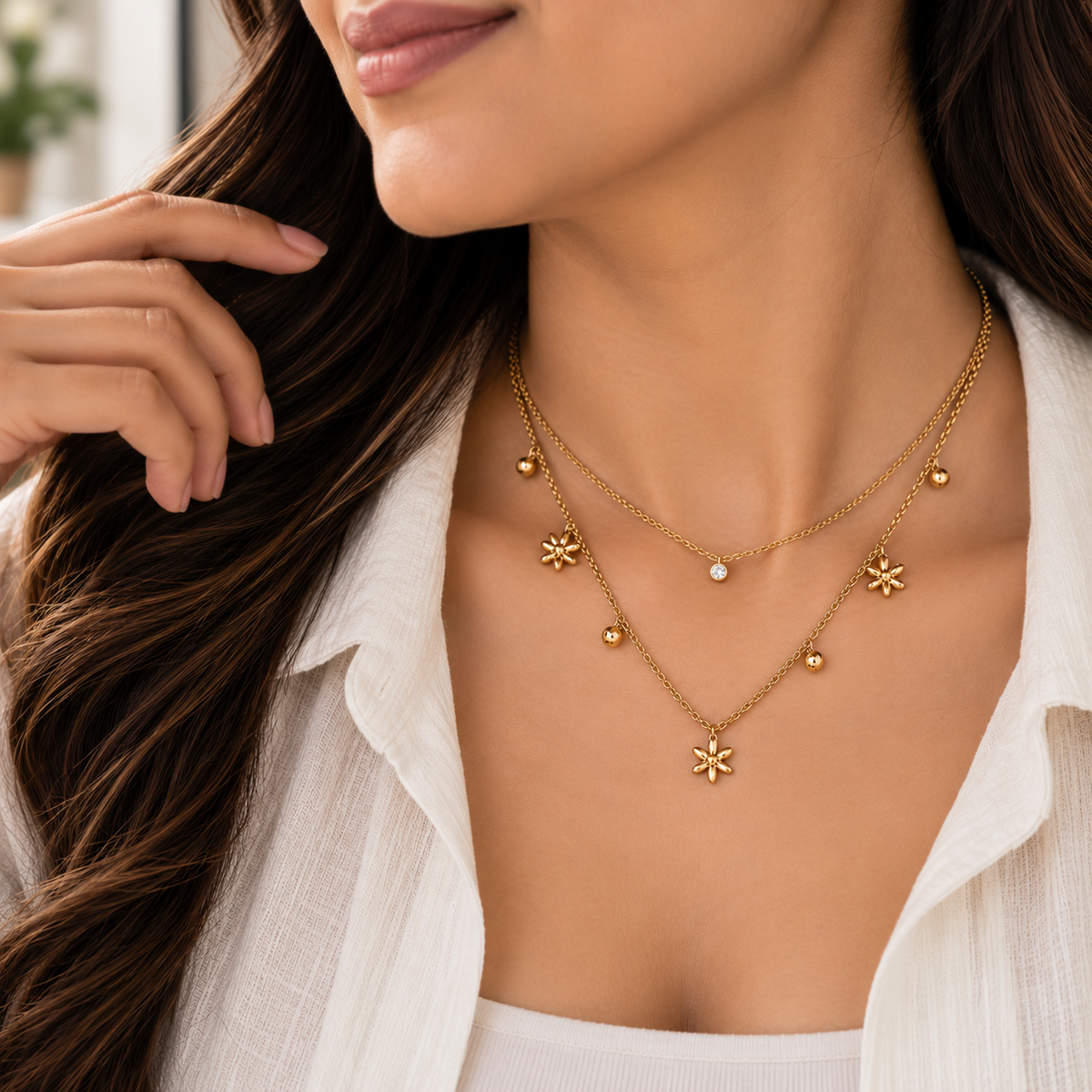 Aveline floral charm necklace layered with a delicate gold-tone chain