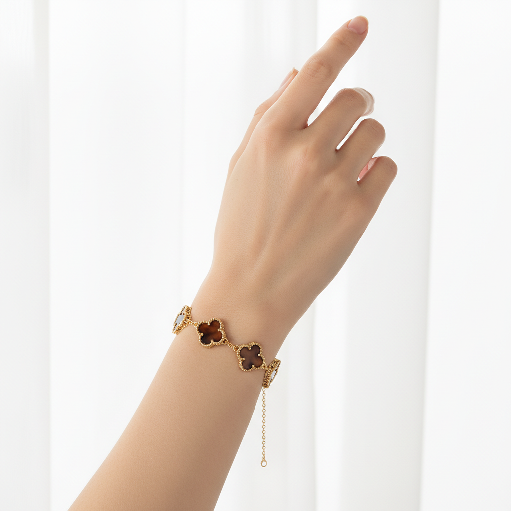 Woman wearing brown clover waterproof chain bracelet minimal everyday bracelet