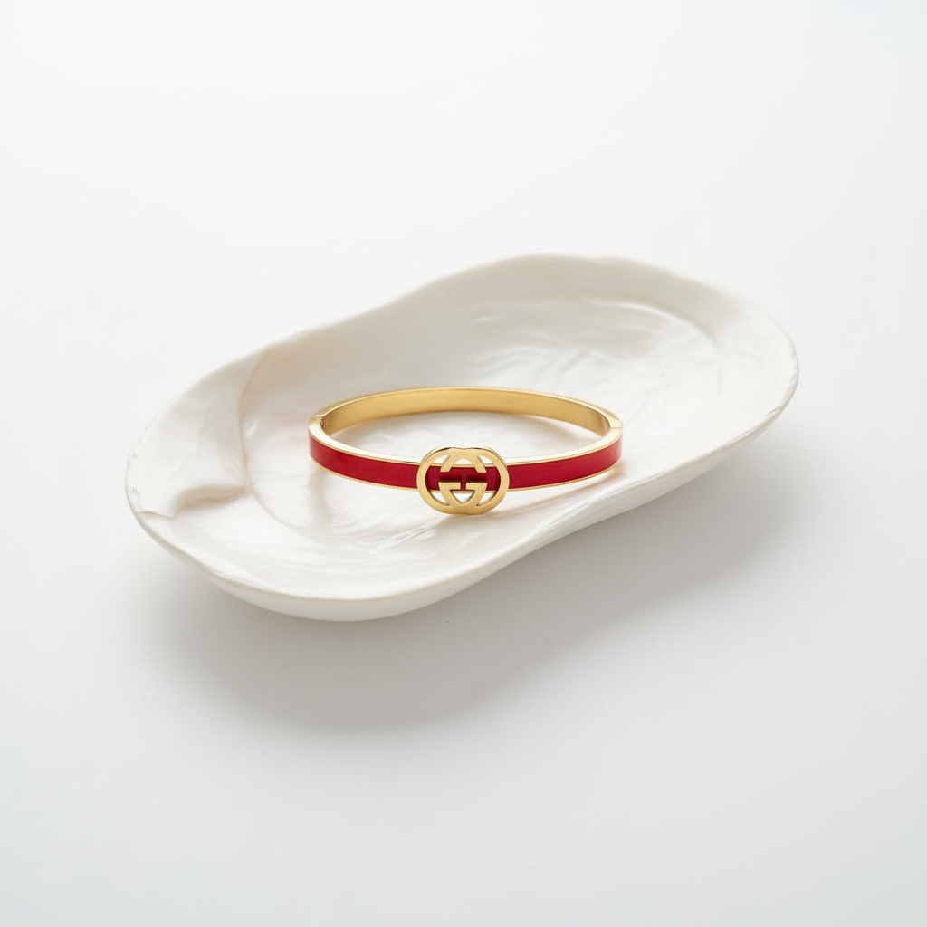 Red designer logo bangle bracelet flat lay gold enamel bracelet for women