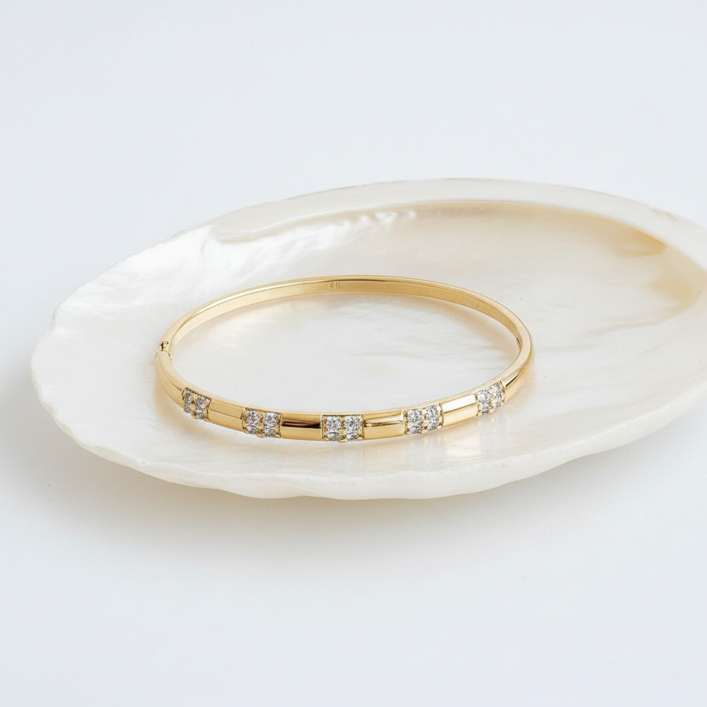 Crystal station bangle bracelet flat lay gold crystal bracelet for women