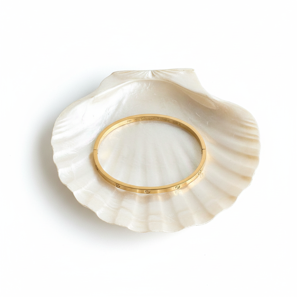 Slim screw bangle bracelet flat lay minimal gold bracelet for women