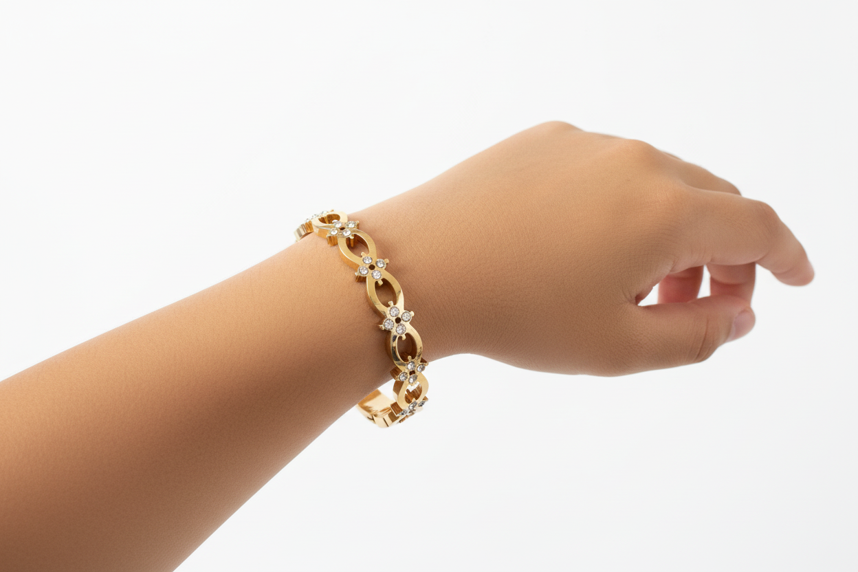 Woman wearing gold wave link crystal bracelet baby size delicate everyday bracelet