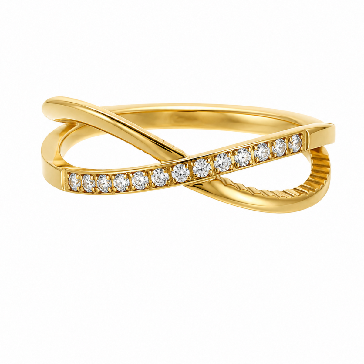 Elowen crisscross gold ring with sparkling clear stones on white background