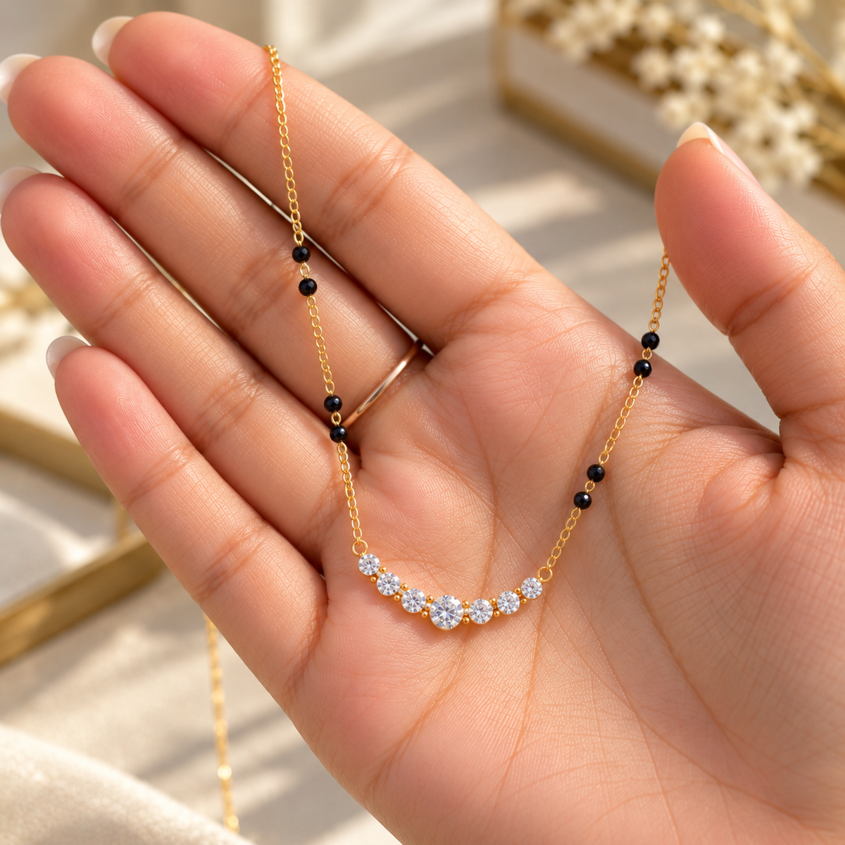 aarika-delicate-modern-mangalsutra-hand