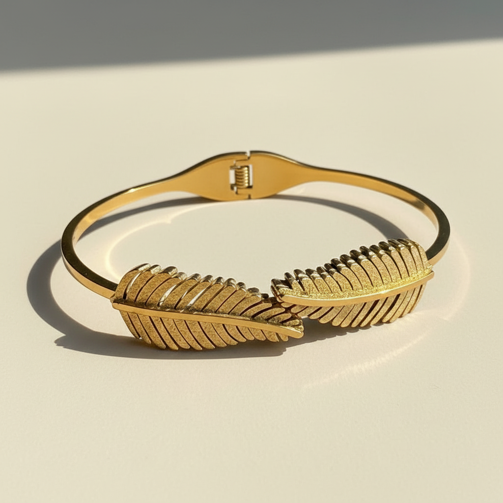 18k gold plated leaf feather bangle bracelet minimal feather bracelet for women on white background
