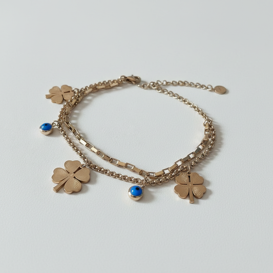 Clover evil eye charm bracelet gold plated lucky protection bracelet for women on white background