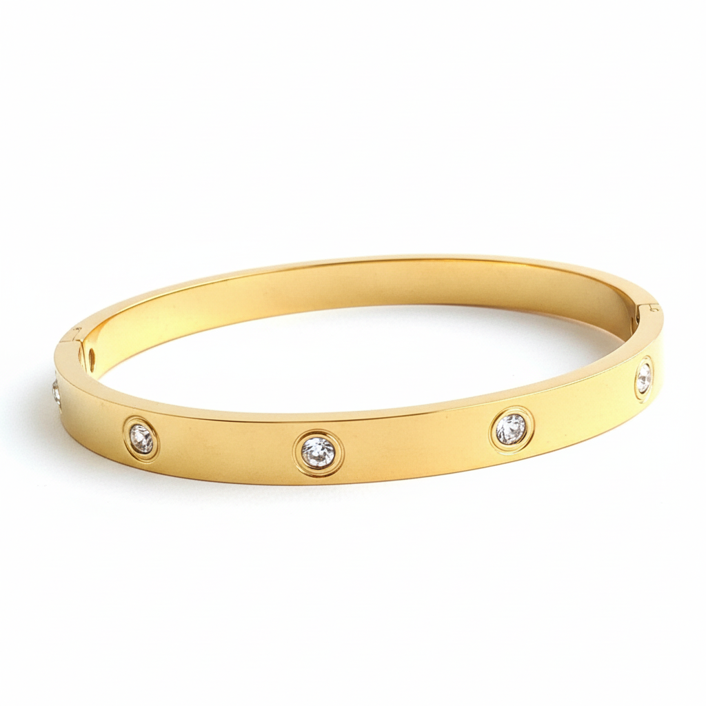 Crystal stud cartier style bangle wide gold-plated bracelet for women on white background
