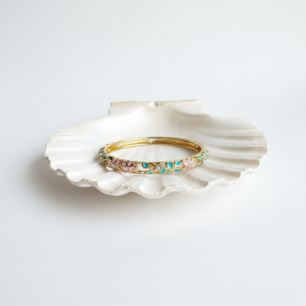 Flat lay of bangle on shell tray