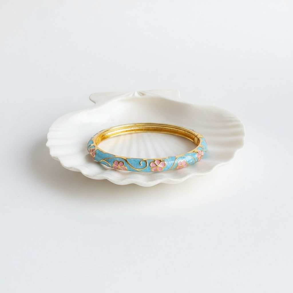 Flat lay of bangle on shell tray