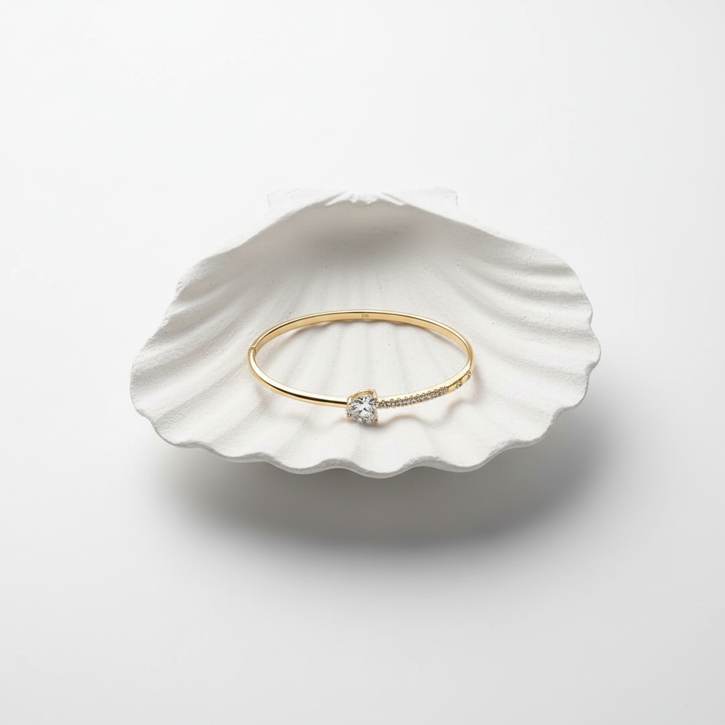 Crystal heart pave slim bangle bracelet flat lay gold heart bracelet with crystals