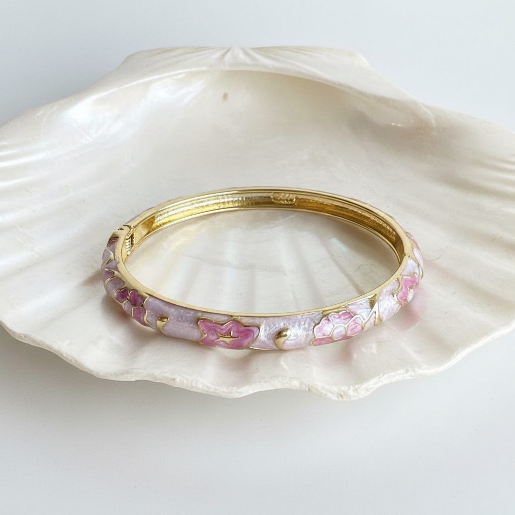 Pink baby pink floral enamel bangle bracelet flat lay gold floral enamel bracelet for women