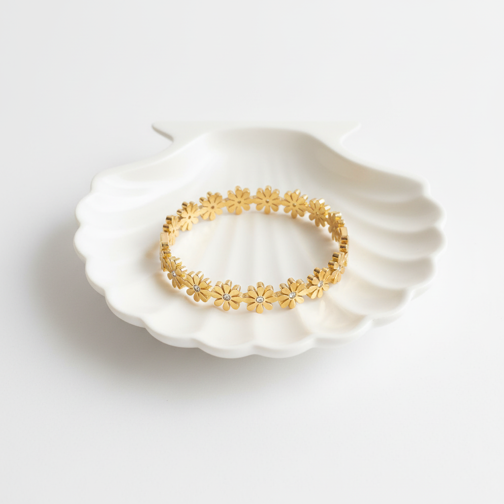 Daisy flower 18k gold-plated bangle bracelet flat lay minimal gold floral bracelet for women