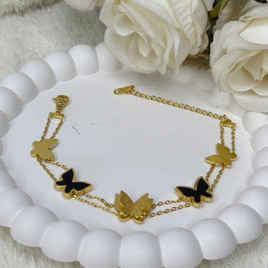 Butterfly charm chain bracelet gold plated butterfly bracelet for women on white background