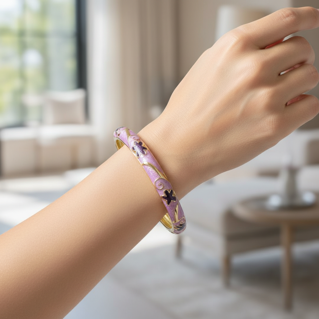 Lifestyle wrist shot of purple butterfly enamel bangle