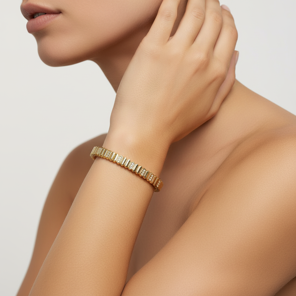 Woman wearing geometric ridged crystal 316L stainless steel bangle bracelet minimal everyday bracelet