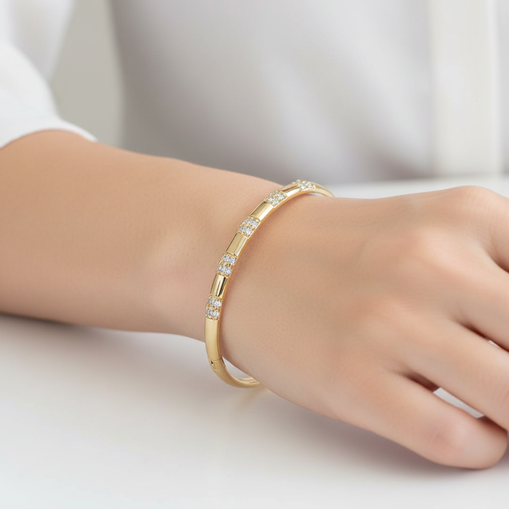 Woman wearing crystal station bangle bracelet minimal gold crystal bracelet for everyday wear