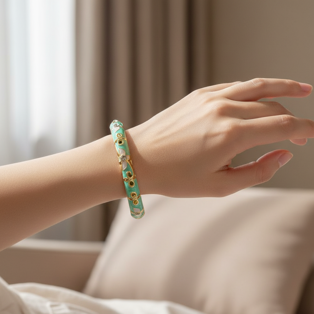 Woman wearing turquoise crystal scroll enamel bangle bracelet minimal everyday gold bracelet