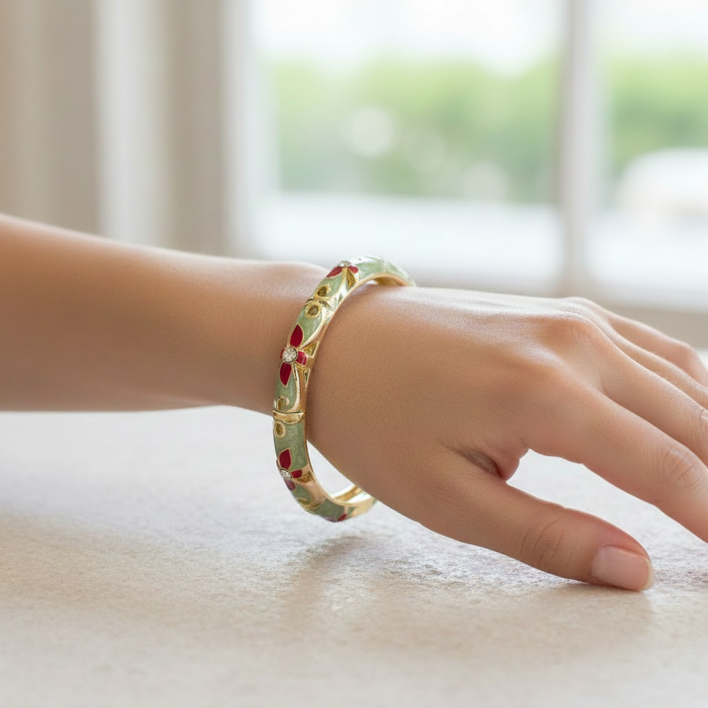 Woman wearing mint green and red floral enamel bangle bracelet minimal gold everyday bracelet