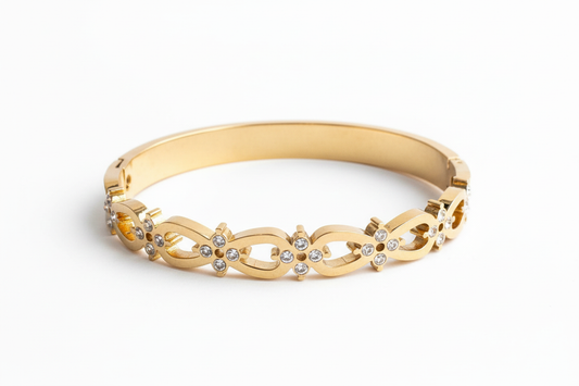 Gold wave link crystal bracelet baby size minimal gold bracelet for women on white background