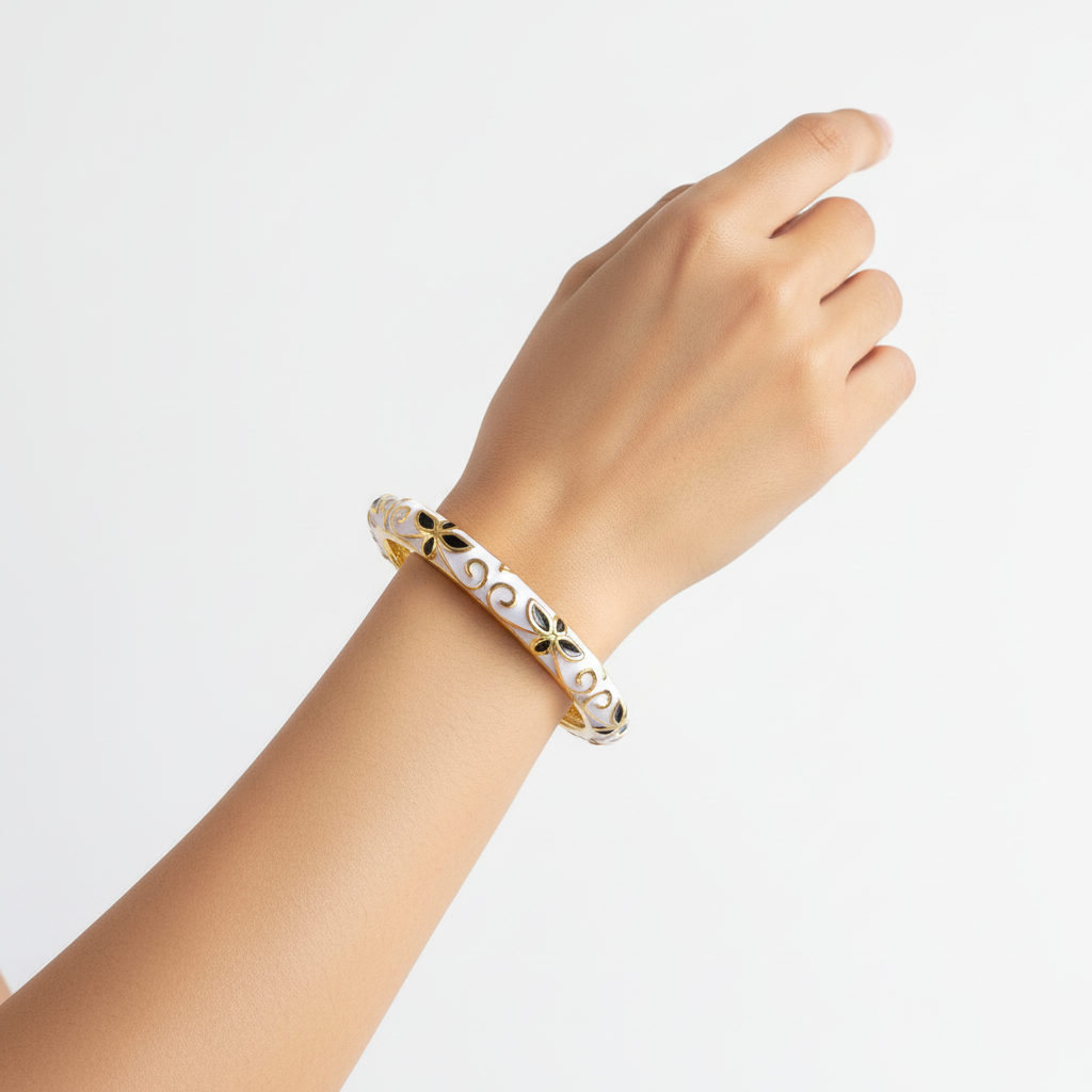 Woman wearing white enamel bracelet