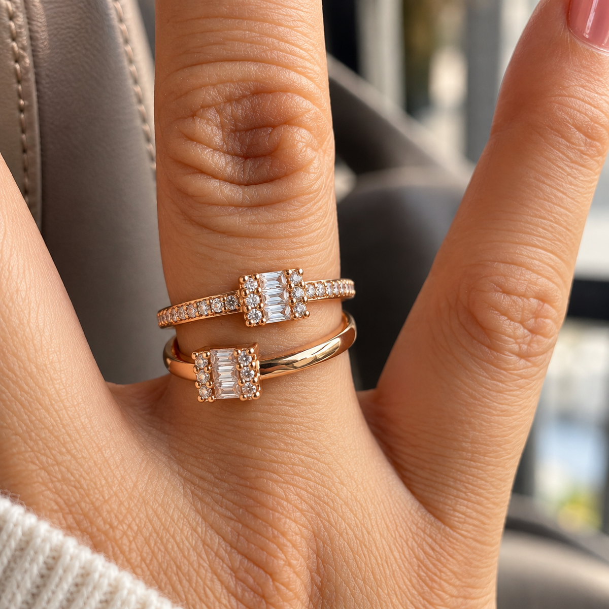 Zaria Baguette Crystal Ring in rose gold tone worn on a woman's hand