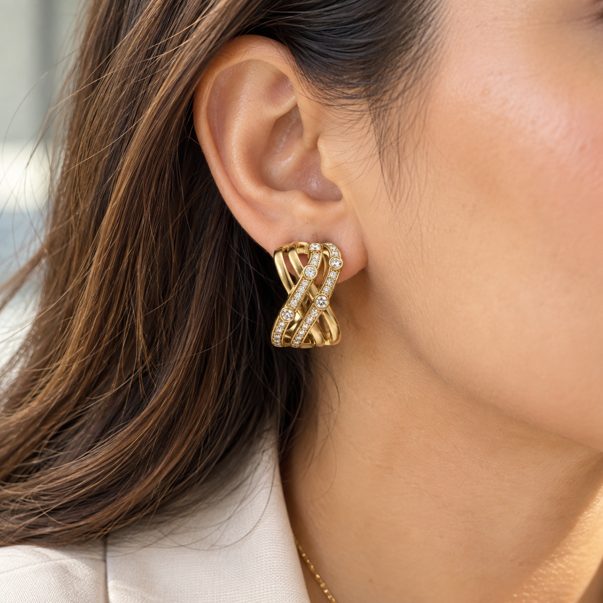 Woman wearing Zivara Crystal Crossover Earrings